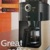 Philips HD7768/90 Grind & Brew Filter Kaffeemaschine, Mahlwerk, Timer, Champagner/schwarz
